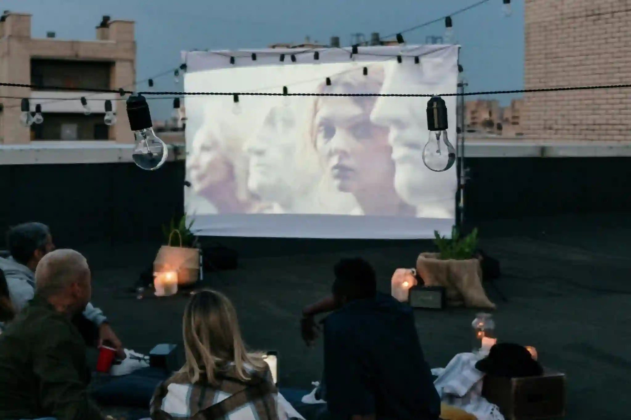 Friends enjoying an outdoor cinema experience